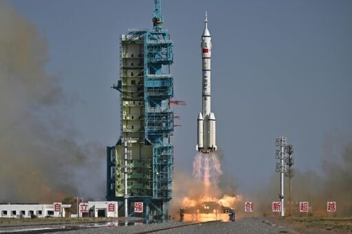 A Long March-2F carrier rocket, carrying the Shenzhou-20 spacecraft and a crew of three astronauts, lifts off from the Jiuquan Satellite Launch Centre in the Gobi desert