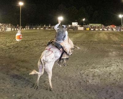 Cliff Williams / TPI Barrell man T.J. Williams keeps an eye on a bull rider at last year’s Wetumpka FFA Alumni Rodeo. Williams will be back Friday and Saturday night to provide a comedic relief to the rodeo, something he has done for years.