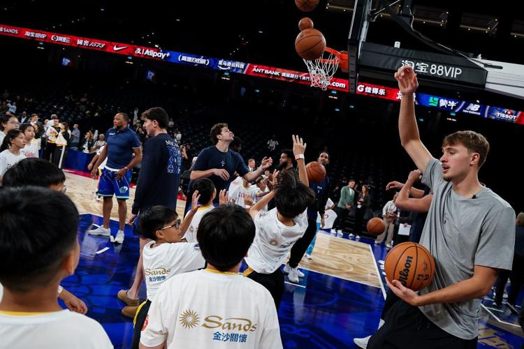 Players and coaches from the Dallas Mavericks and Houston Rockets lead local students in a basketball clinic on the NBA court at The Venetian Arena, providing skills demonstrations and hands-on coaching. The activity offered Macao youth a valuable oppor...