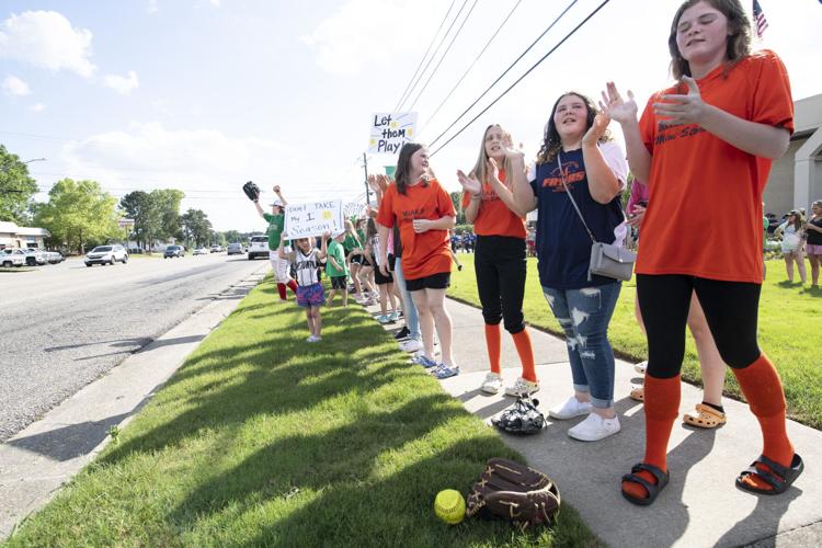 PHOTOS: Children, parents protest for kids to play ball