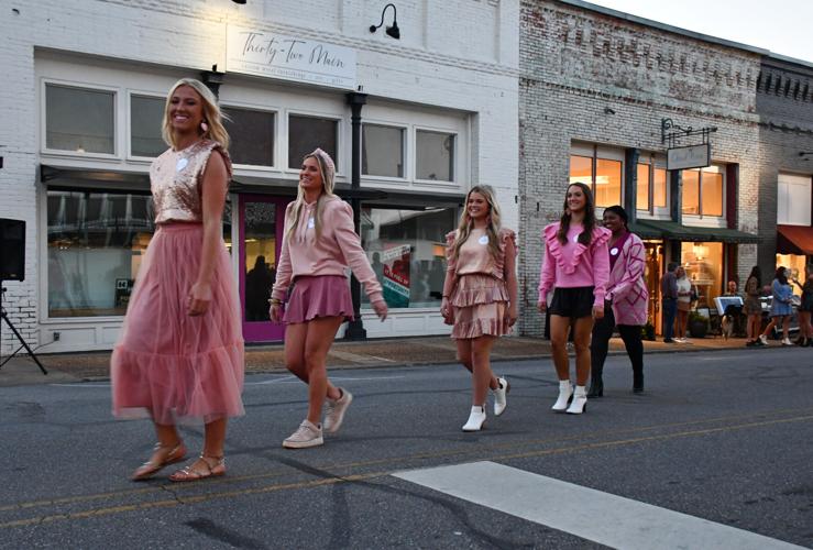 PHOTOS: Models strut down Main Street at 'Sip, Shop and Support'