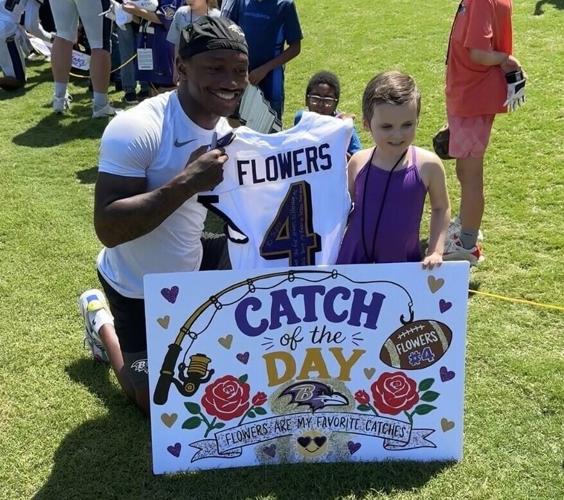 Ravens WR Zay Flowers gifts MedStar Health patient Sunny a signed jersey.