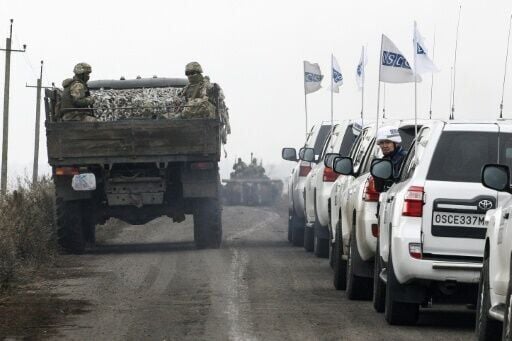 A convoy of OSCE monitors (right) in the Donetsk region of eastern Ukraine in 2019
