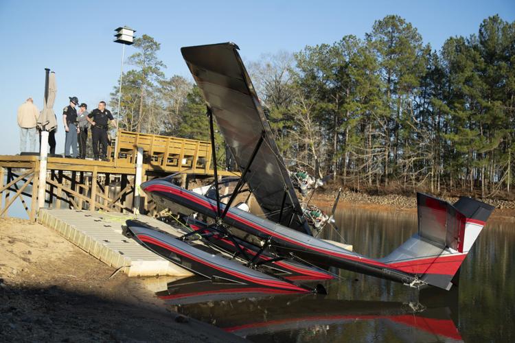 PHOTOS: Seaplane crash lands on Lake Martin