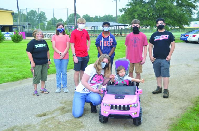 Stella’s ride: WHS students adapt toy car for toddler with disabilities