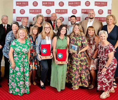 Submitted / TPI Scott and Donna Grier and members of the Wetumpka Depot join Main Street Alabama and Main Street Wetumpka for a photograph in Enterprise last week for an awards banquet.