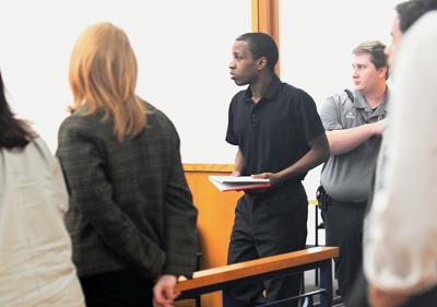Cliff Williams / TPI Isaac Mathis, 31, of Miami, walks into the courtroom of Judge Joy Booth just before the jury comes back with a verdict in trial where he was charged with first-degree rape, first-degree robbery, attempted murder and attempted arson.