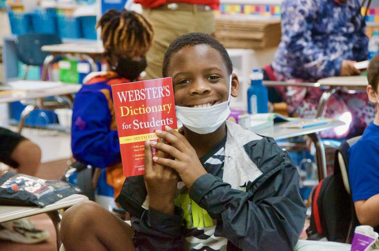 Third graders at TES get dictionaries thanks to Tallassee Rotary Club