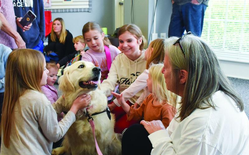 Auburn Therapy Dogs visit children’s library