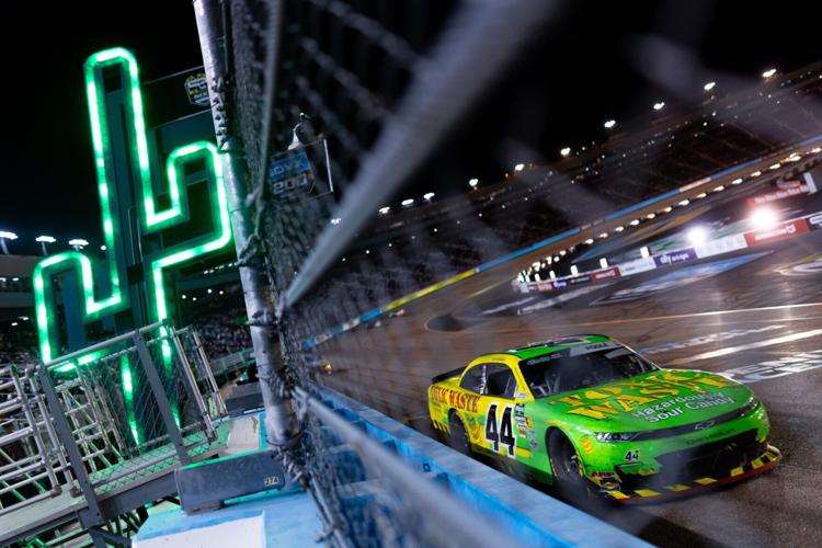 The Toxic Waste® Hazardously Sour Candy® races in Phoenix with NASCAR driver Brennan Poole.