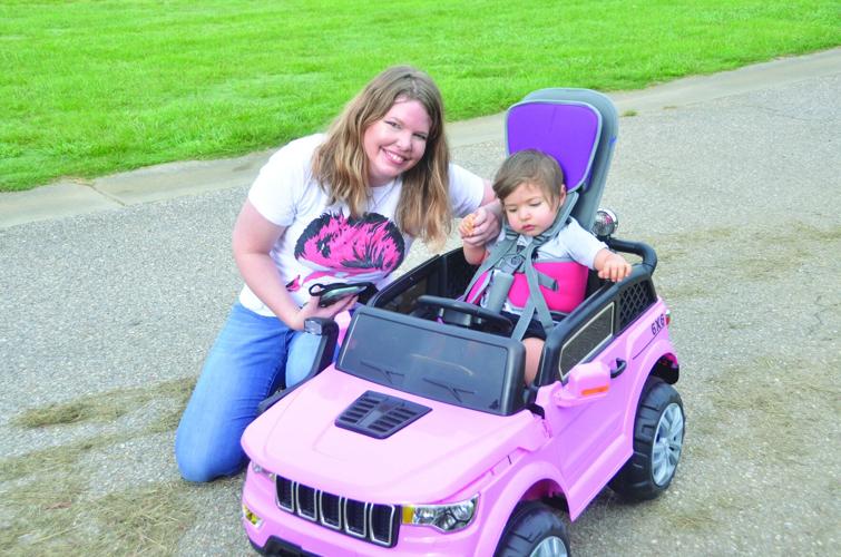 Stella’s ride: WHS students adapt toy car for toddler with disabilities