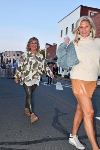 PHOTOS: Models strut down Main Street at 'Sip, Shop and Support'