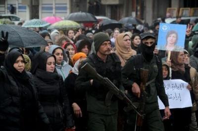 Kurds rallied in Qamishli against a Syrian government advance before the announcement of a truce deal that many now see as a betrayal of their aspirations