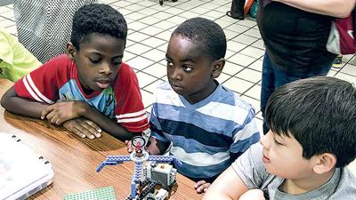 Reading campers learn with 70-year-old toys