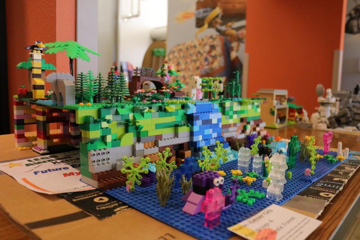 Sisters use Lego bricks to create a foundation