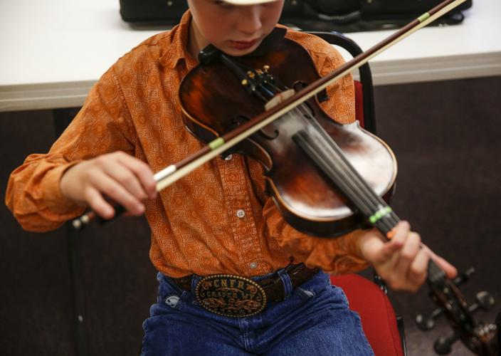 Musicians keep tradition alive at Wyoming's last remaining fiddle ...