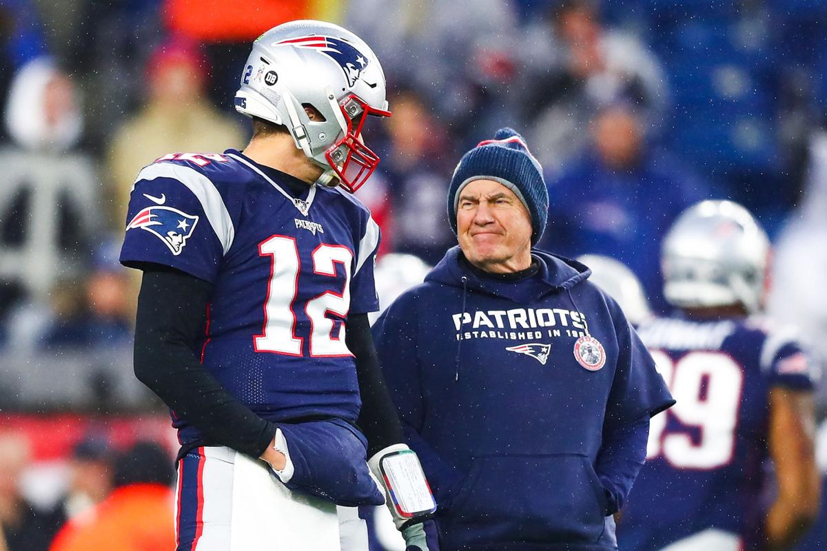 Tom Brady #12 talks to head coach Bill Belichick of the New England Patriots before a game against the Dallas Cowboys at Gillette Stadium on Nov. 24, 2019 in Foxborough, Mass.