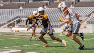 Mackey, DeBlanc fall camp.jpg