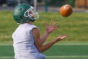High school football practice kicks off