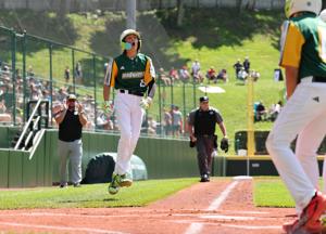 Cooper Thissen of Davenport, Iowa, (Midwest Region) rouns the bases after hitting a solo homerun in the first inning against