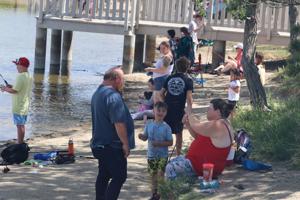 PHOTOS: Heat doesn’t keep Casper families away from annual Kids Fishing Day