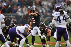 Sep 20, 2026; Chicago, Illinois, USA;  Chicago Bears quarterback Caleb Williams (18) calls the snap count at the line of scrimmage against the Minnesota Vikings defense during the first quarter at Soldier Field.  Mandatory Credit: Patrick Gorski-Imag