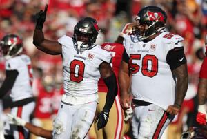 YaYa Diaby (0) and Vita Vea are two of the Buccaneeers' top players on a stout defense.