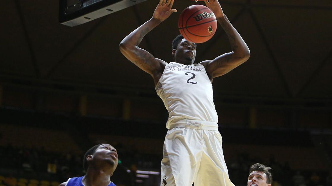 Wyoming men's basketball changes speeds by playing traditional post players together