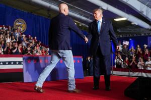 Most Republicans in tight midterm races distance themselves from Trump, Reuters review finds