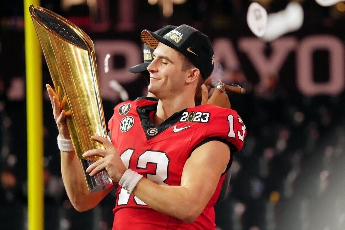 new college football trophy 2022