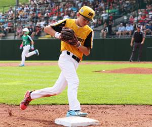 Third basemen Easton Allen of Phenix, AL (Southeast Region) tags the bag for a force out against Tacoma, WA (Northwest Region)