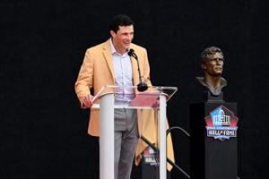 Luke Kuechly speaks during the Pro Football Hall of Fame Enshrinement Ceremony at Tom Benson Hall of Fame Stadium on Saturday, Aug. 8, 2026, in Canton, Ohio.