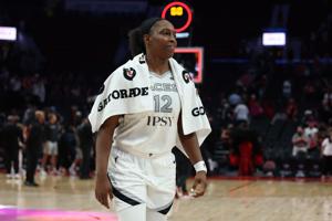 Jul 9, 2026; Portland, Oregon, USA; Las Vegas Aces guard Chelsea Gray (12) walks off the court after the win over against the Portland Fire at Moda Center. Mandatory Credit: Soobum Im-Imagn Images