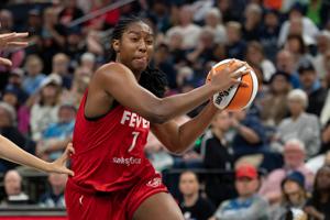 Indiana Fever forward Aliyah Boston (7) drives to the basket against the Minnesota Lynx in the second half at Target Center.