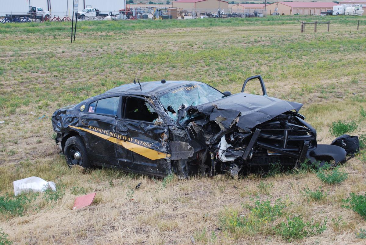 Man dies in officer shooting in Douglas; trooper hurt in crash while