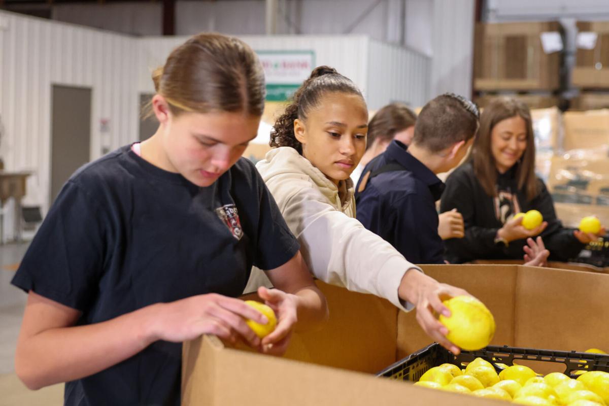 NC soccer team helps at Wyoming Food Bank