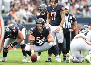 Chicago Bears center Logan Jones sets the ball before a play in the second quarter of a preseason game against the Cleveland Browns on Saturday, Aug. 15, 2026, at Soldier Field in Chicago.