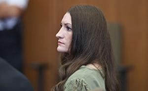 Defendant Lindsay Clancy watches jurors enter the courtroom, as the jury resumes deliberations, in Plymouth Superior Court, in