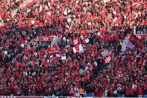 Utah Utes fans celebrate a touchdown against the Kansas State Wildcats during the second half at Rice-Eccles Stadium.