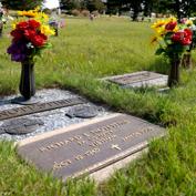 She left flowers on the graves of her child and her husband on Memorial Day. The
bouquets were missing when she visited again