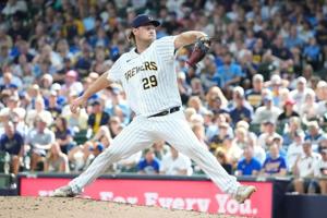 Aug 9, 2026; Milwaukee, Wisconsin, USA; Milwaukee Brewers relief pitcher Trevor Megill (29) delivers a pitch against the Minnesota Twins in the ninth inning at American Family Field. Mandatory Credit: Michael McLoone-Imagn Images