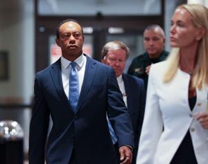 Tiger Woods appears in County Judge Darren Steele's courtroom for a change of plea hearing from an arrest in March, Sept. 2,