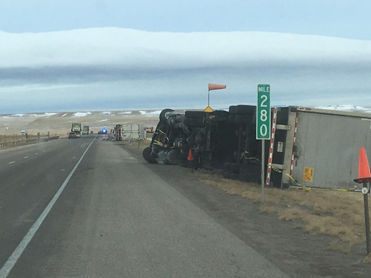 High winds cause dozens of crashes; video shows semi jackknife on icy