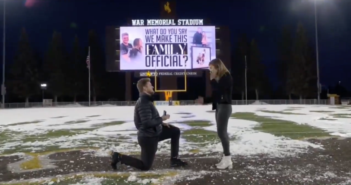 Watch former Wyoming football player Logan Wilson get engaged at War