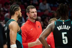 Portland Trail Blazers assistant coach Tiago Splitter instructs players during the second half against the Sacramento Kings at Moda Center on April 12, 2026, in Portland, Oregon.