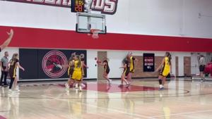 Southeast's Kaycee Kosmicki knocks down a 3-pointer in the South's victory over the North on Saturday.
