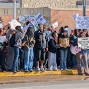 SUV flying Trump flag runs down student
at ICE protest near school, flees the scene