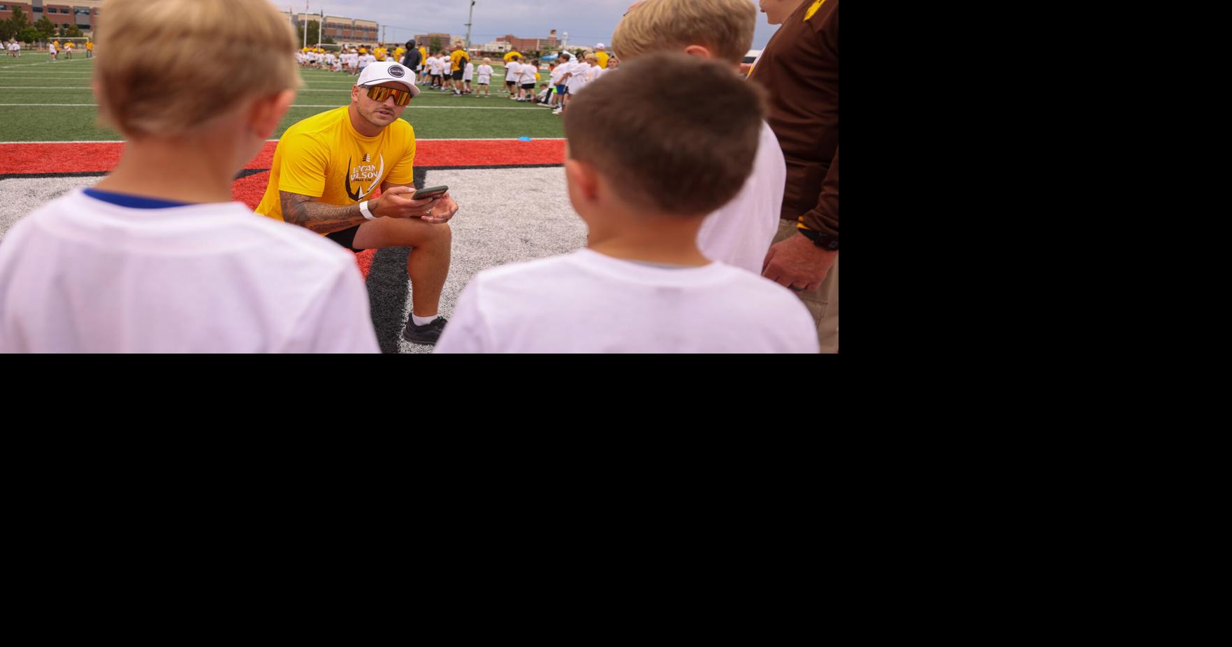 PHOTOS: Logan Wilson returns to Casper for youth football camp
