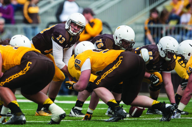 Wyoming O-line looks to dispel question marks