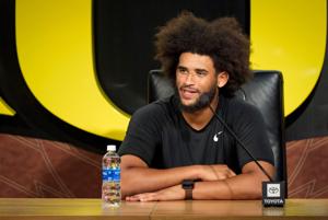 Oregon quarterback Dante Moore speaks during a press conference on Aug. 18, 2026, at the Hatfield-Dowlin Complex in Eugene,